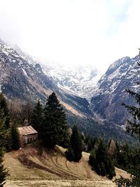 Scenic view of mountains against sky during winter