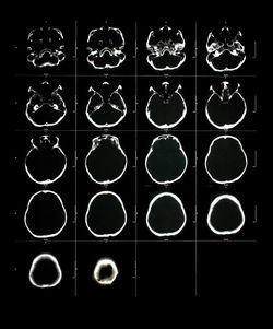 Digital composite image of metal against black background