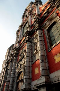 Low angle view of old building against sky