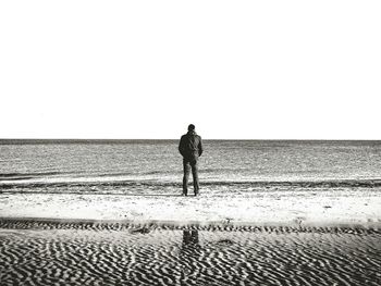 People standing on beach