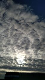 Low angle view of cloudy sky during sunset