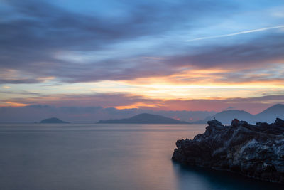 Scenic view of sea against sky during sunset