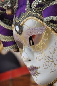 Close-up of venetian mask at market