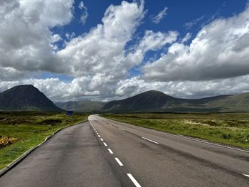 Empty road against sky