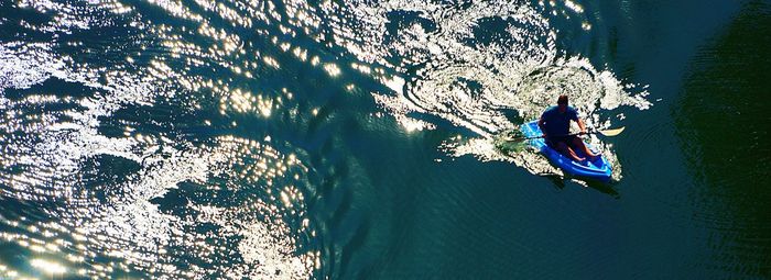 High angle view of people in sea