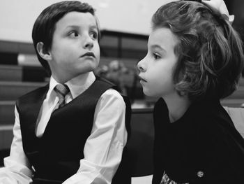 Friends sitting in classroom during christmas