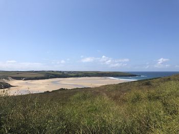 Scenic view of beach against sky