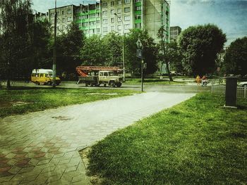 Vehicles on street in a sunny day of summer