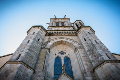 Low angle view of historic building against sky