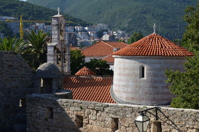 Exterior of houses against sky in city