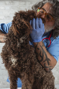 Side view of woman with dog