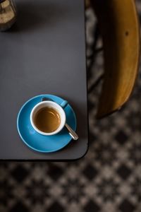 High angle view of coffee cup on table