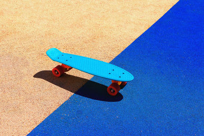 High angle view of skateboard on playground