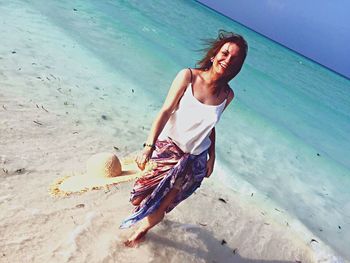 Woman standing on beach