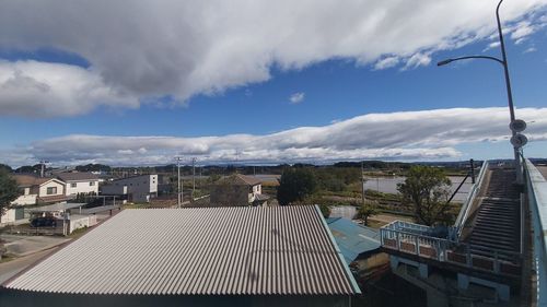 High angle view of buildings against sky