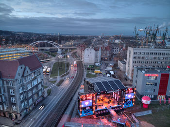 High angle view of city street and buildings against sky