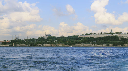 Hagia sophia and blue mosque against cloudy sky