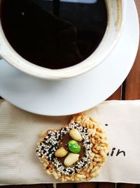 Coffee with rice cracker.