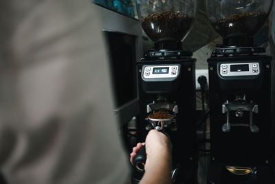 Close-up of hand holding coffee