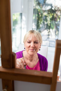 Portrait of woman at home