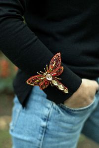 Close-up of hand holding umbrella