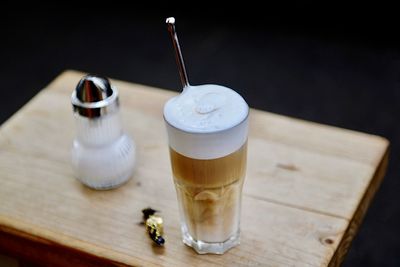 High angle view of coffee cup on table