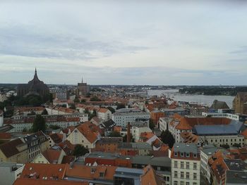 Aerial view of town against sky