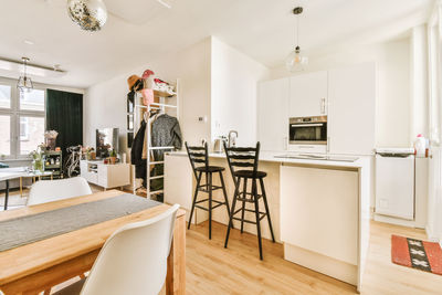 Empty chairs and table at home