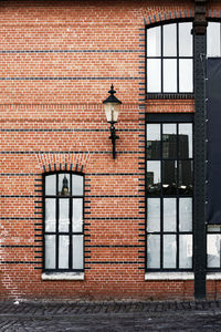 Street light against building