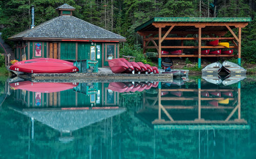 Gazebo in lake against built structure