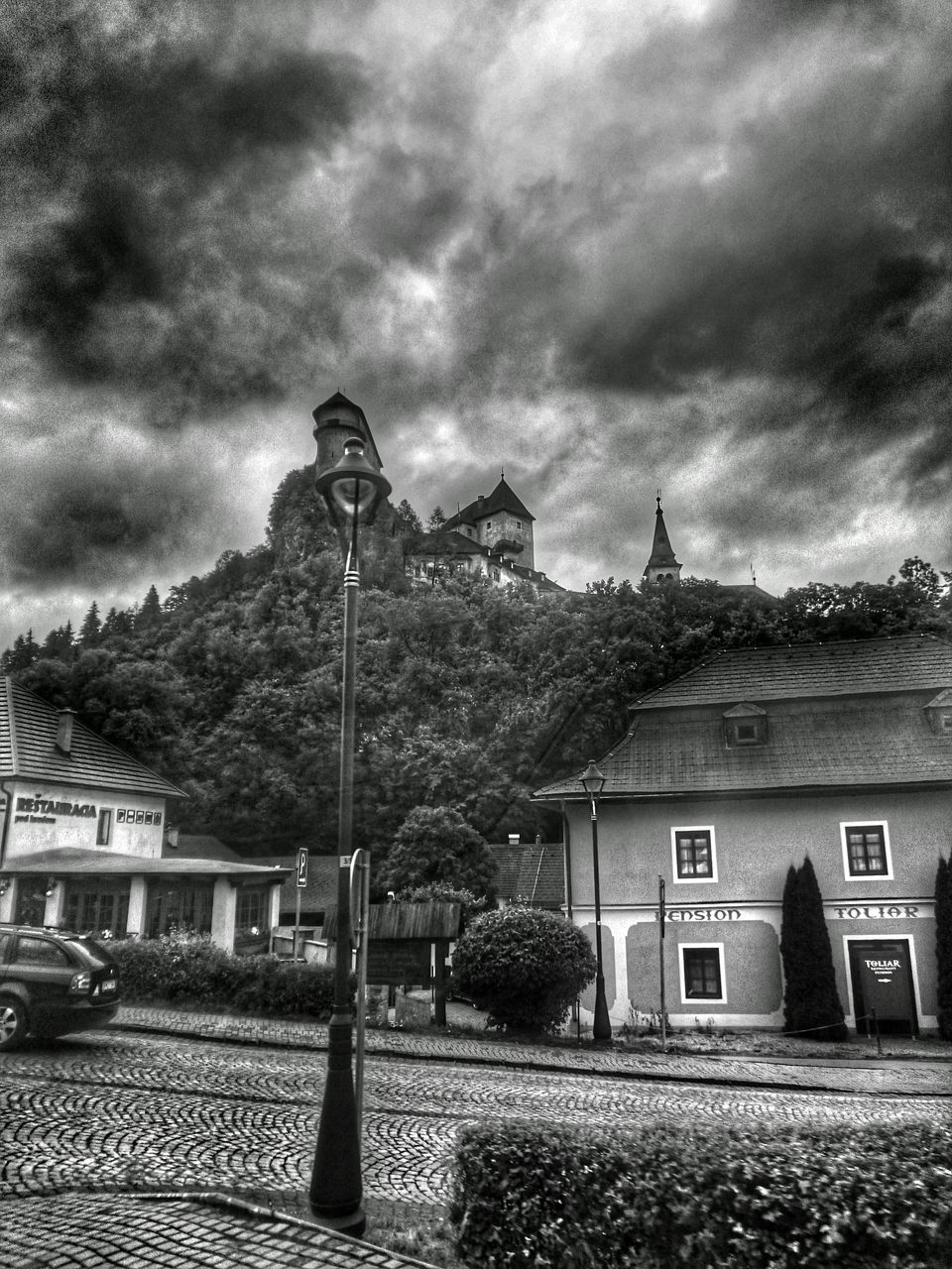 sky, cloud - sky, architecture, cloudy, built structure, cloud, weather, tree, overcast, residential structure, nature, outdoors, day, no people, mountain, growth, beauty in nature, tranquility, landscape