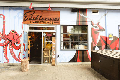 Text on footpath by building in city