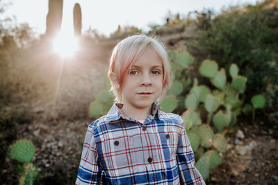 Portrait of non binary child in the desert