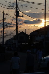 Silhouette of city at sunset