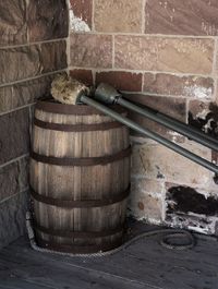 Close-up of beer glass against wall