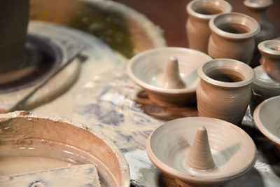 Close-up of various pottery