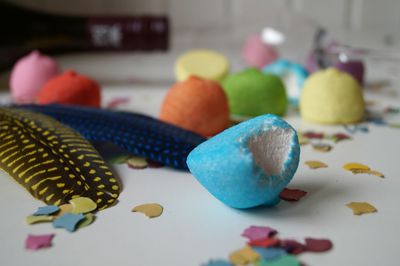 Close-up of multi colored balls on table