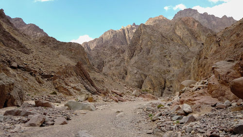 Scenic view of rocky mountains against sky