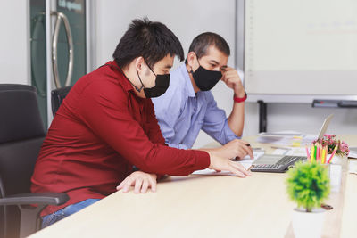 Men working on table