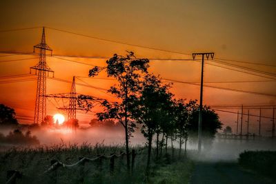 Electricity pylon at sunset