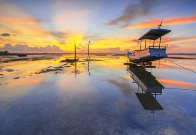 Scenic view of sea against sky at sunset