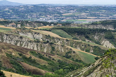 High angle view of land against mountains