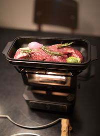 Close-up of food in container on table