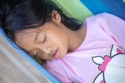 Close-up portrait of girl sleeping