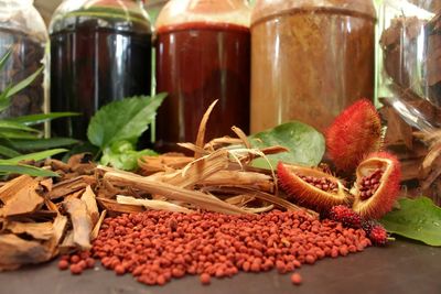 Close-up of fruits in jar on table