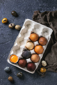 High angle view of eggs in container on table