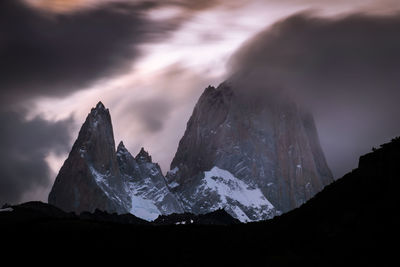 Scenic view of mountains against sky during sunset