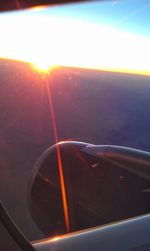 Sun shining through airplane