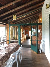 Empty chairs and tables in building