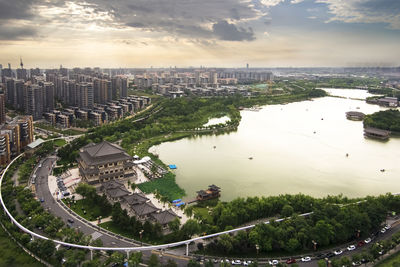 High angle view of river amidst buildings in city